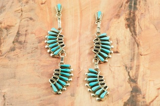 Stunning Earrings featuring Genuine Sleeping Beauty Turquoise set in Sterling Silver. Beautiful Post Earrings with Petit Point Design. The Sleeping Beauty Turquoise mine is located in Gila County, Arizona. Created by Zuni Artists Ziemund and Ethel Peina. The Zuni Pueblo is located in New Mexico, Land of Enchantment.